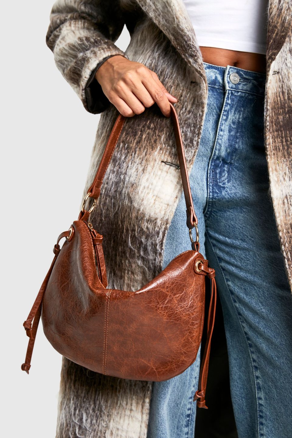 Distressed Leather Round Tassel Shoulder Bag
