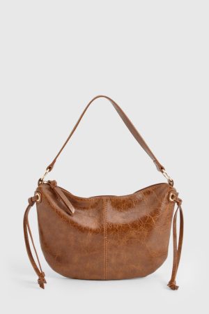 Distressed Leather Round Tassel Shoulder Bag