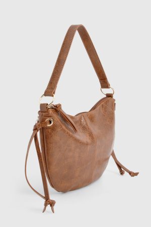 Distressed Leather Round Tassel Shoulder Bag
