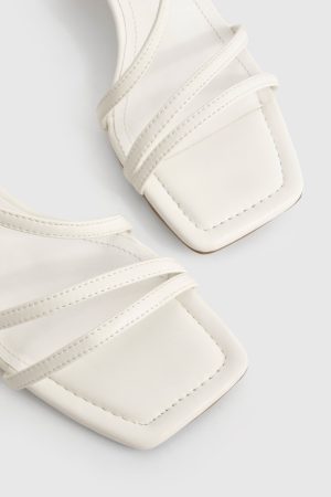 Asymmetric Low Block Heels