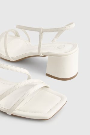 Asymmetric Low Block Heels